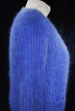 Woman's powder-blue angora cardigan sweater with pockets by Connie A. Lee