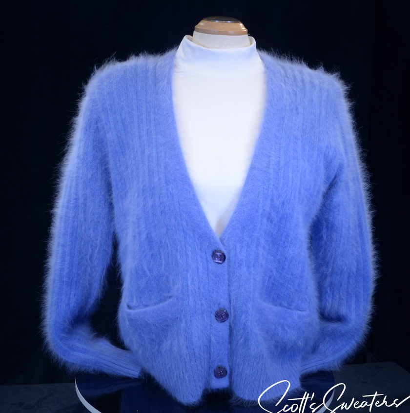 Woman's powder-blue angora cardigan sweater with pockets by Connie A. Lee
