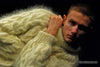Men's handknit thick cabled mohair sweater in crewneck and turtleneck styles, available in white, black, camel, and beige colors