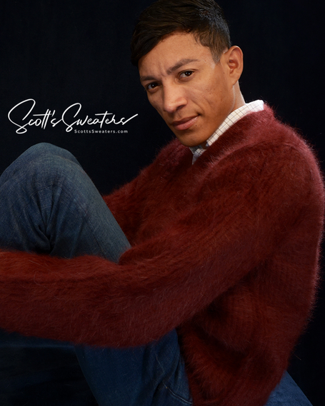 Men's soft luxurious angora sweater in deep red with rib-knit design and V-neck collar.