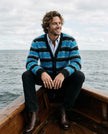 Men's fuzzy cardigan with colorful stripes made from soft plush fabric for casual comfort and style