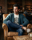 Men's mohair cardigan sweater in vibrant color, lightweight and warm wool blend, perfect for versatile layering.